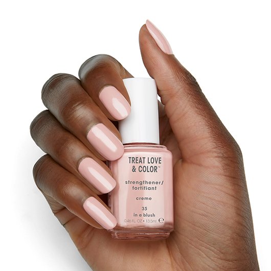 in a blush white nail strengthener essie treat love color